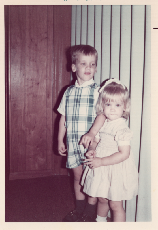 A boy and girl are photographed