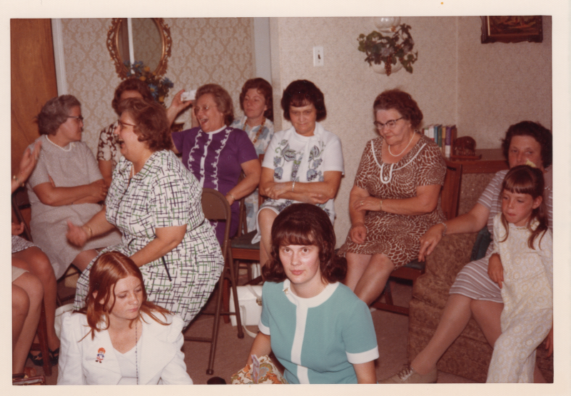 Women seated at a celebration