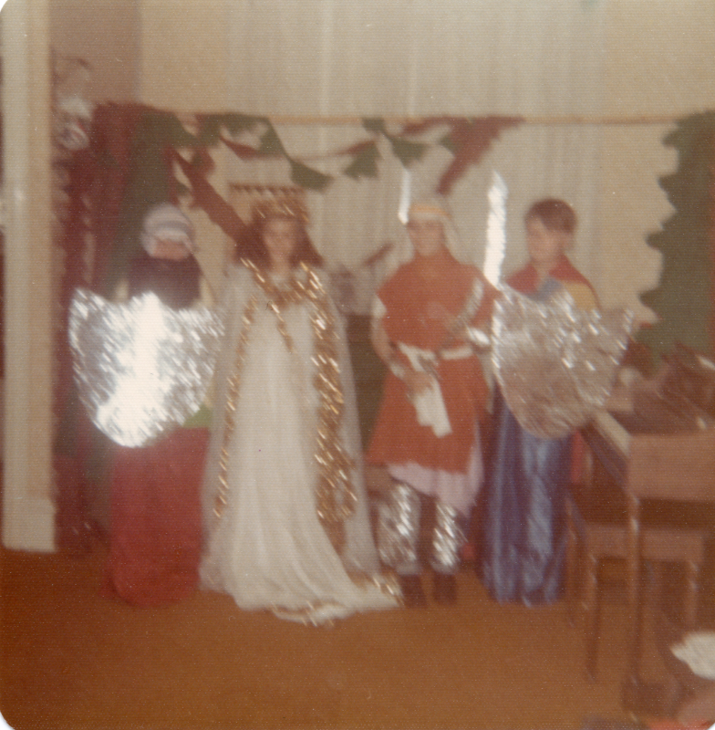 Children decorated with armor and weapons made of aluminum foil