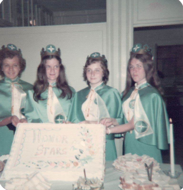 Missionettes pose with a cake reading "Honor Stars"