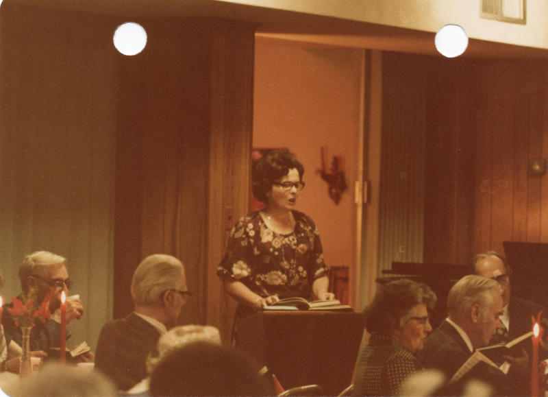 Mrs. Stone leads a hymn