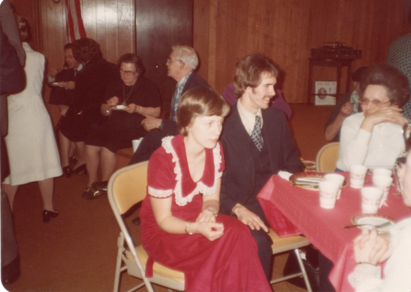 Congregants dine and mingle together