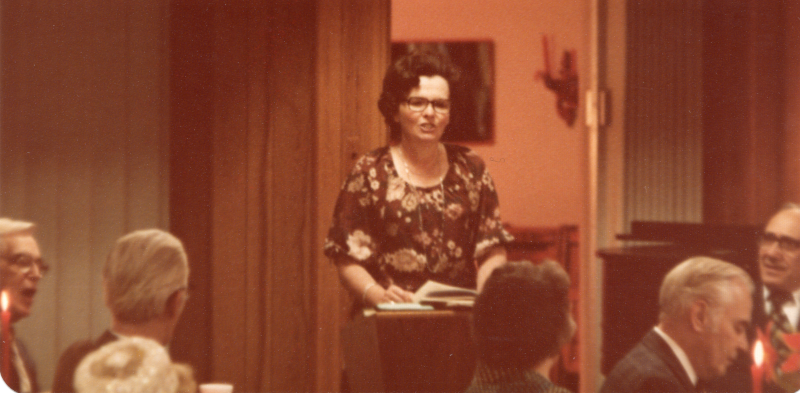 Mrs. Stone speaks from a podium