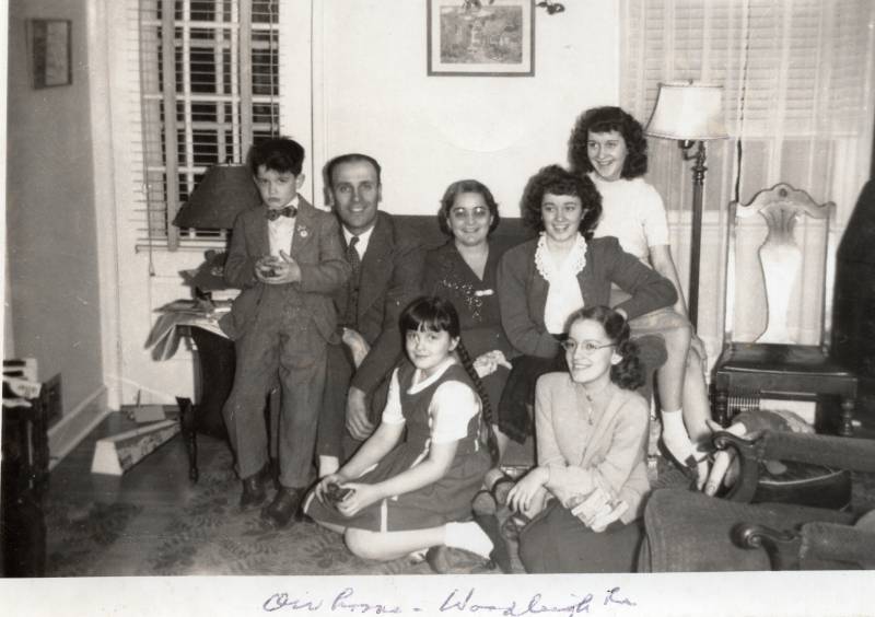 The Bragg family pose for a portrait with the caption, "Our home"