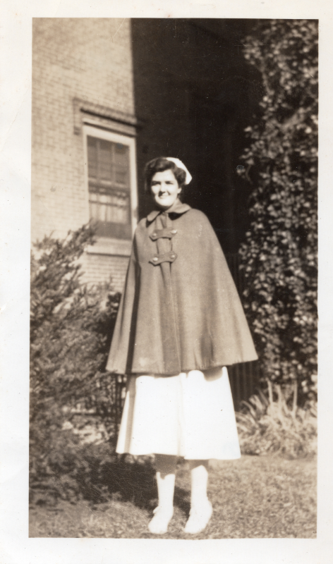 Connie Asburg poses for a photograph in nurse apparel
