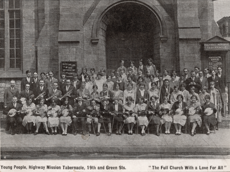 Group portrait titled "Young People, Highway Mission Tabernacle, 19th and Green Sts." Young adults pose, several with instruments, outside of the church at 19th and Green Sts. A quote in the bottom reads "The Full Church With a Love For All"