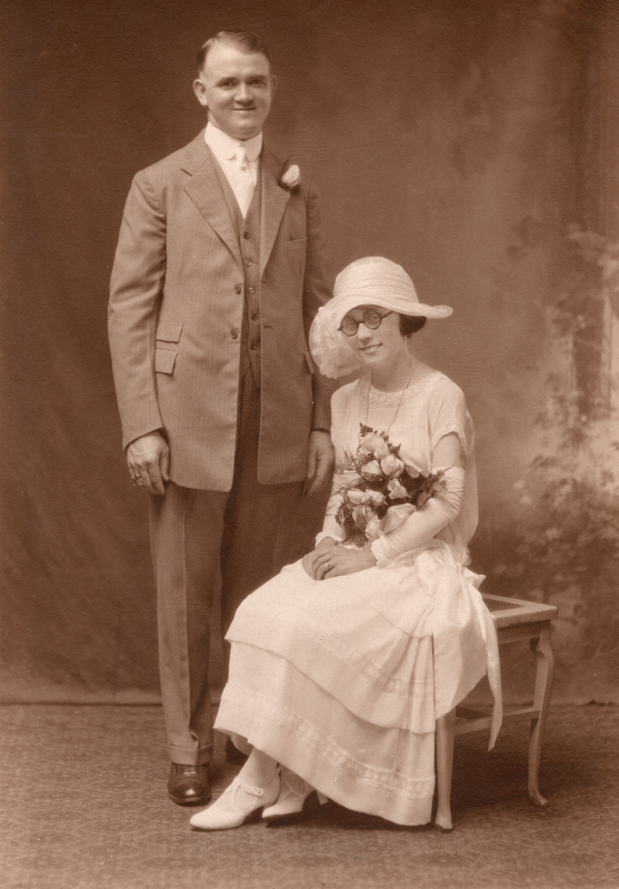 Bride and groom pose together