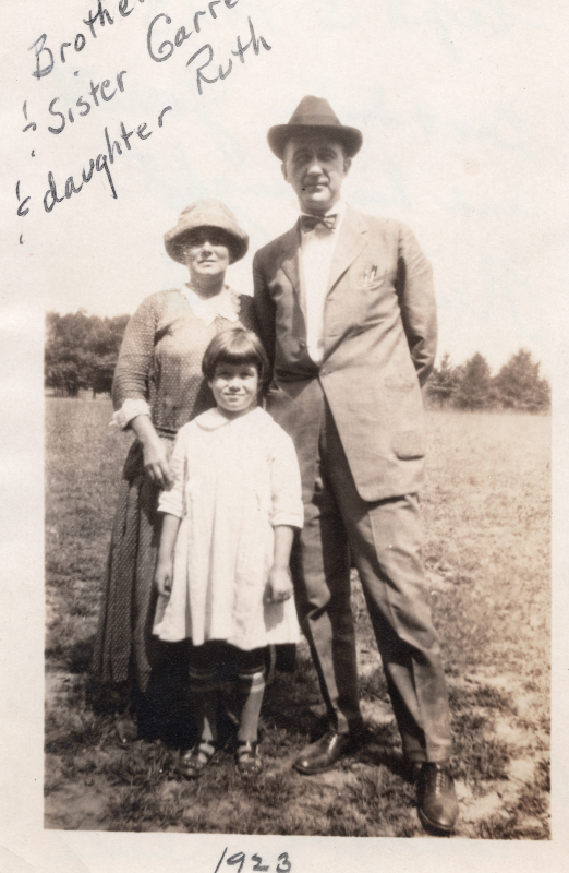 Brother and Sister Garret pose together with their daughter, Ruth