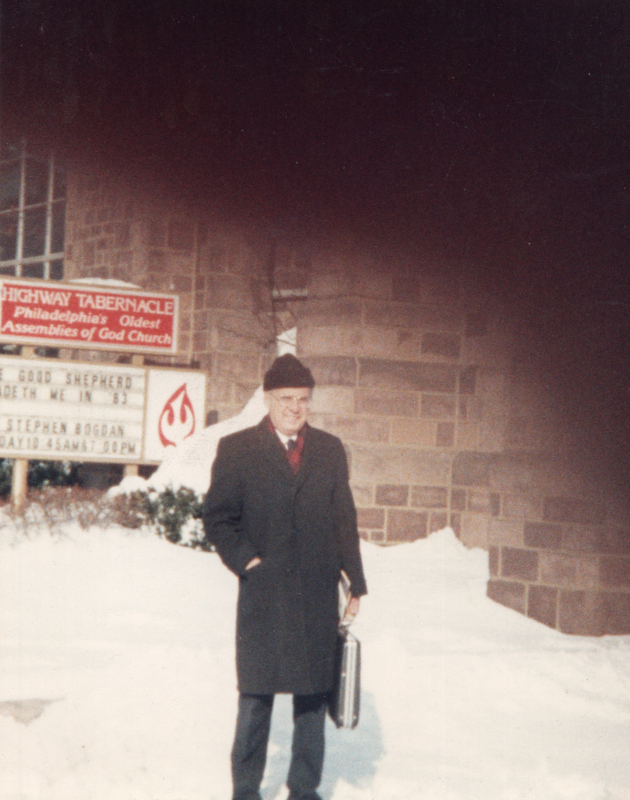 Pastor Bogdan stands in the snow outside of Highway