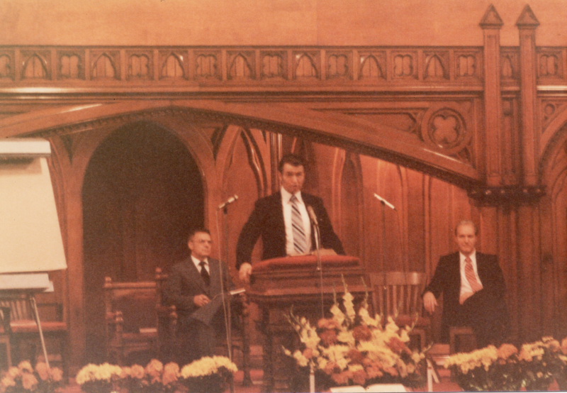 A man addresses the Highway congregation in the sanctuary