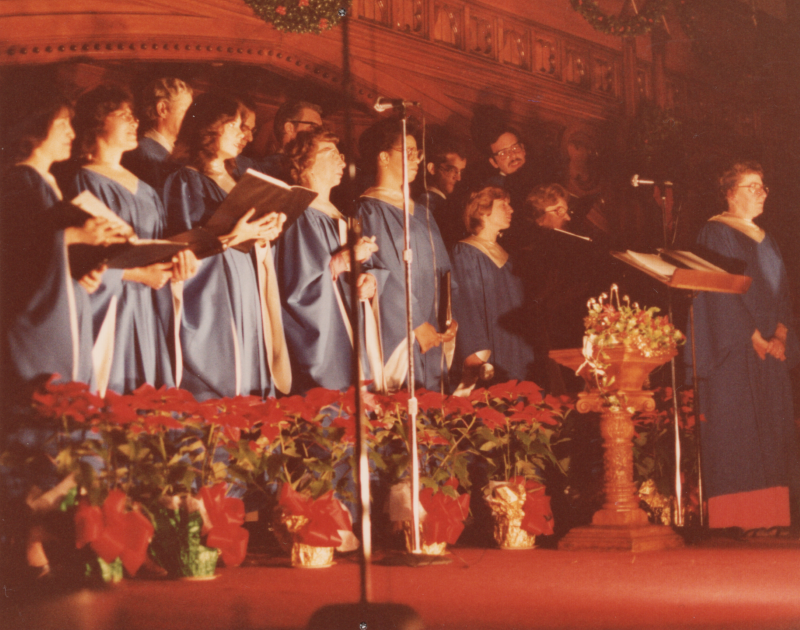 The Highway Choir in blue gowns sings on the day of Pastor Bogdan's birthday celebration
