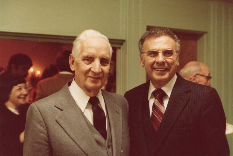 Pastor Roberson and Pastor Bogdan smile together at Pastor Bogdan's birthday celebration