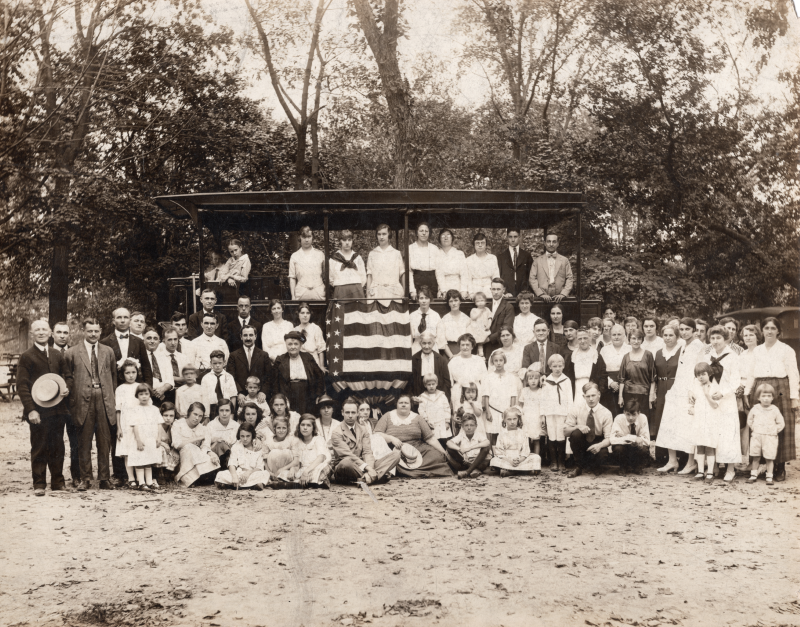 The congregation smiles together for a portrait with the Gospel Wagon