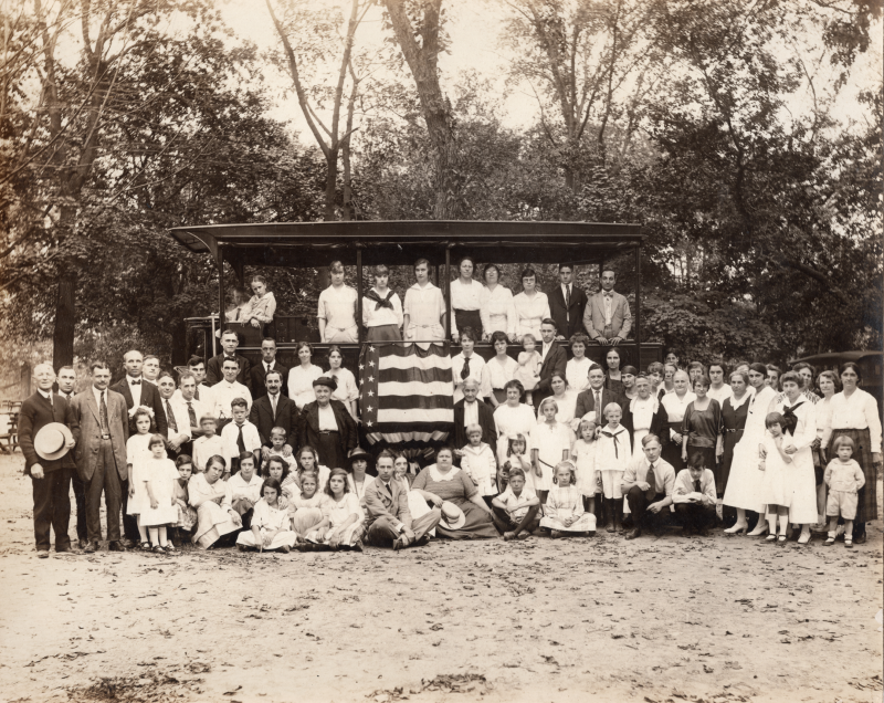 The congregation smiles together for a portrait with the Gospel Wagon