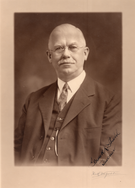 A portrait of Frank K. Stahl, teacher. An unscanned caption reads "Christmas 1927, 'Be ye steadfast, unmoveable, always abounding in the work of the Lord, forasmuch as ye know that your labour is not in vain in the Lord.'"
