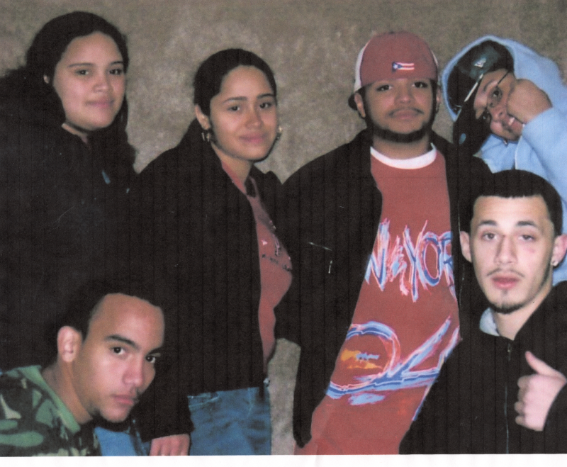 A group smiles for a portrait