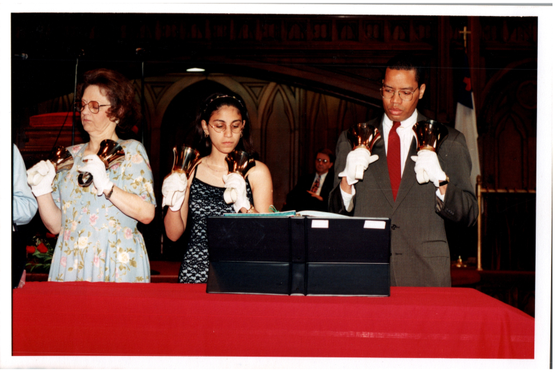 Highway Bell Choir performs with Otis A. Fortenberry, and Rev. Wegner in the background