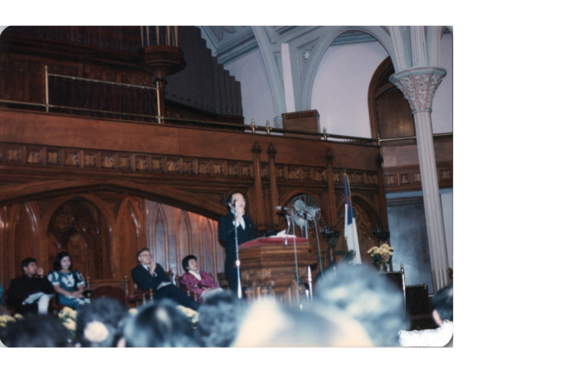 A man speaks at the pulpit