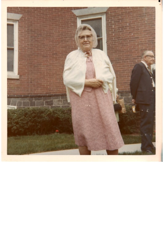 A woman poses for a portrait