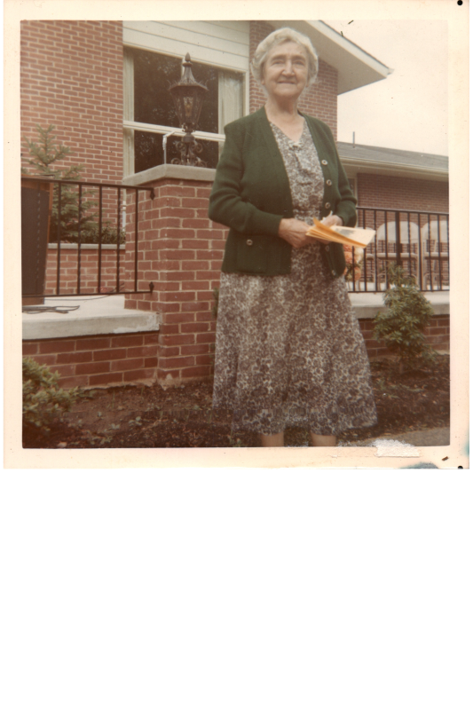 A woman poses for a portrait