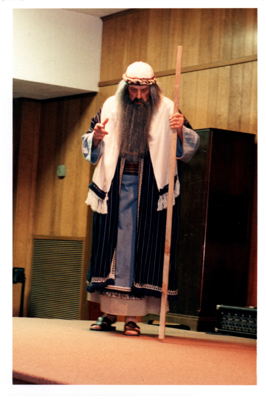 A man dressed in a Biblical costume