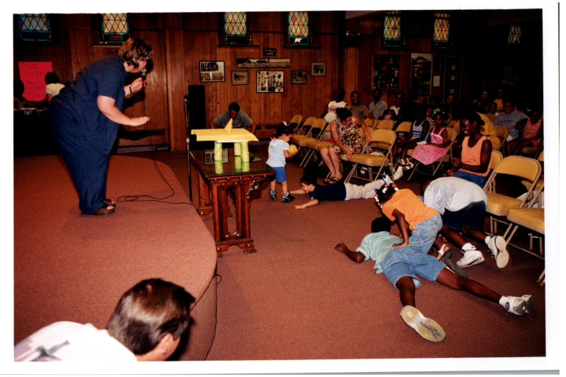 Leaders lead a children's activity