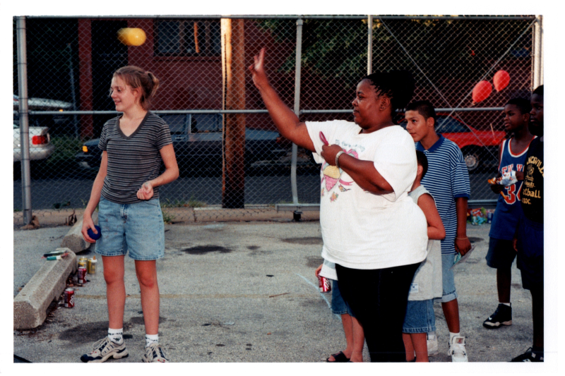 A woman throws a ball