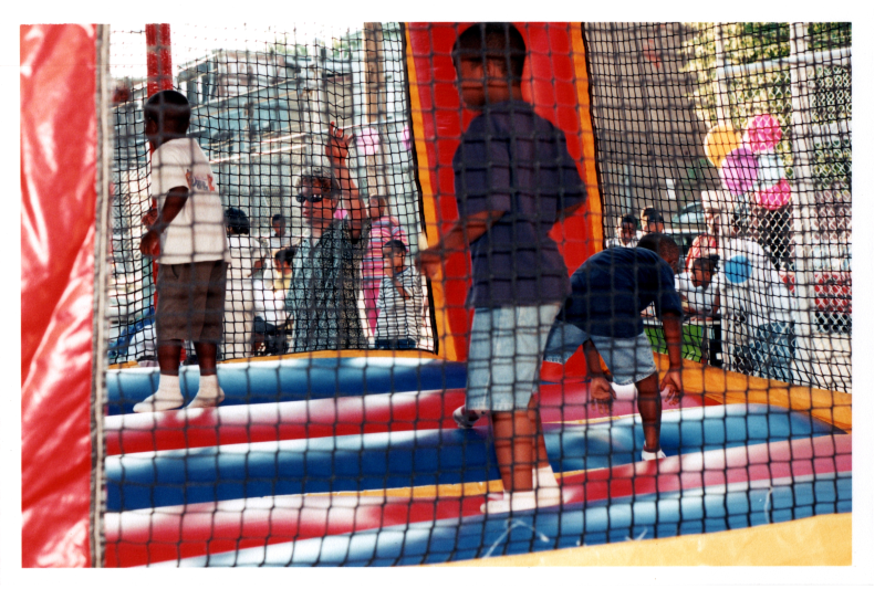Boys play in a balloon house