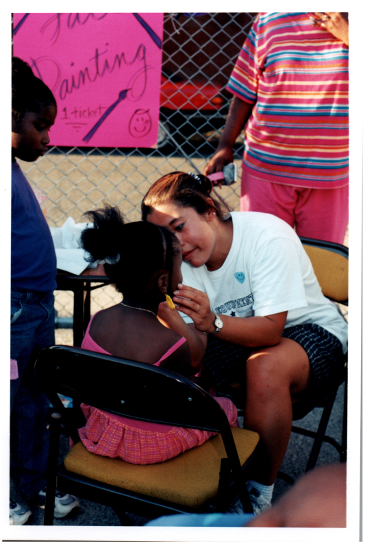 A girl has her face painted