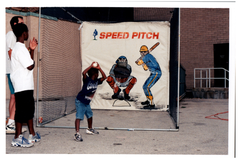 A boy pitches a ball