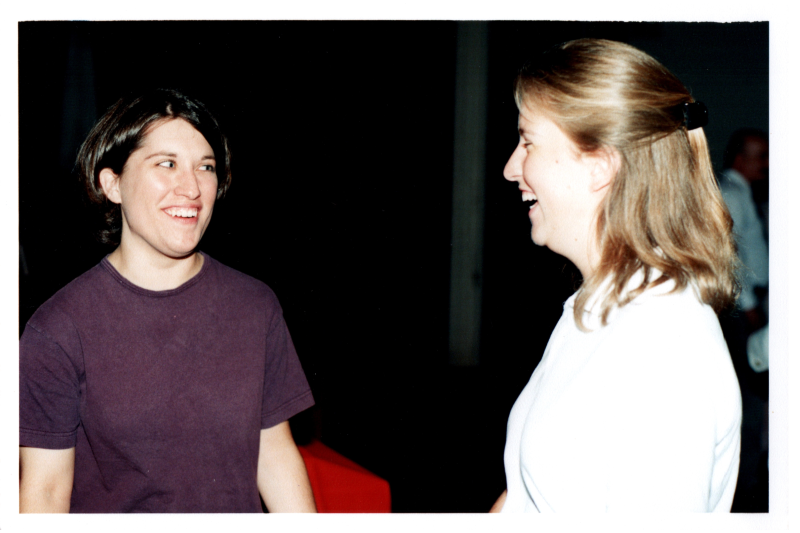 Maria Wulin speaks to a woman