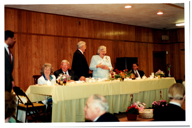 Rev. and Mrs. Bogdan speak from a front table