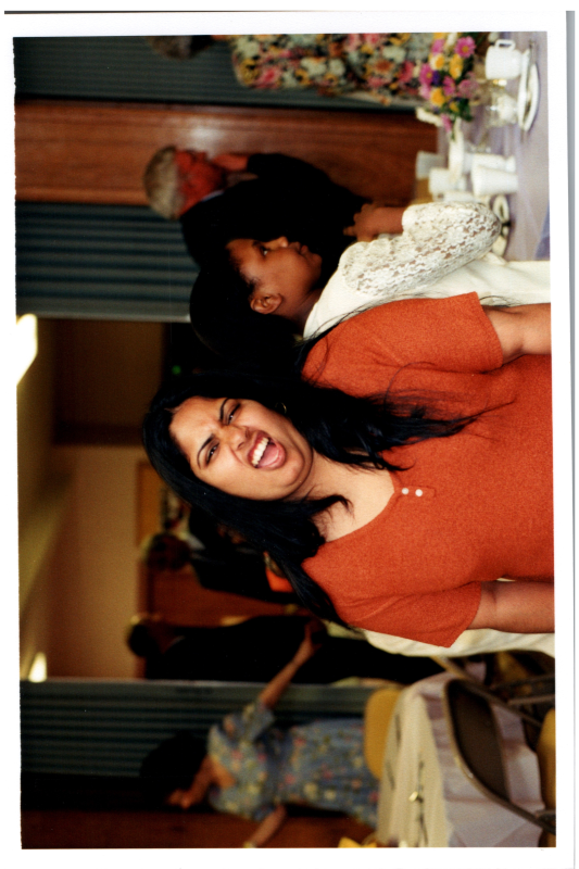 A woman speaks in the sanctuary