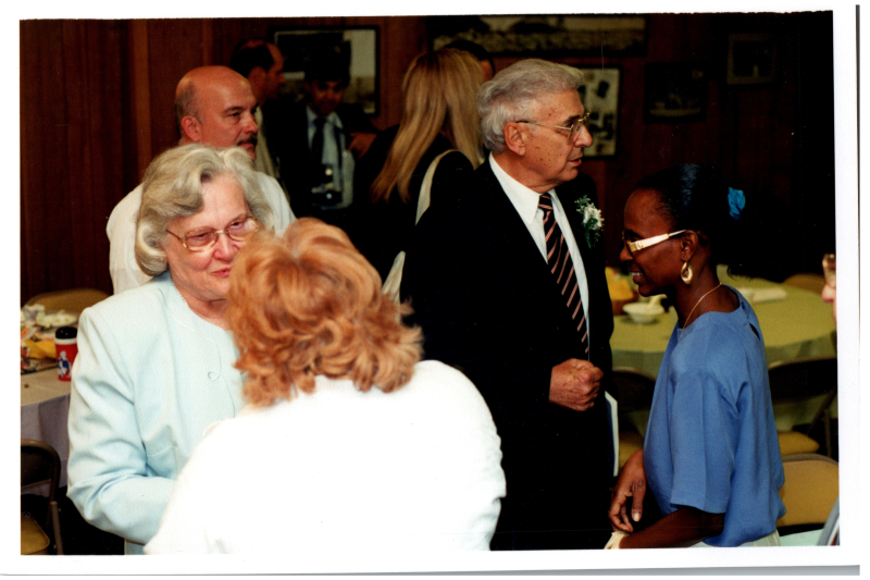 The Bogdans greet congregants