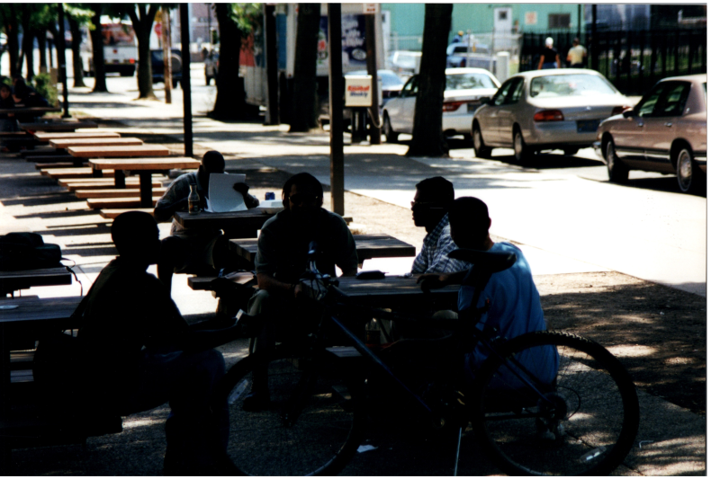 A group talks outside