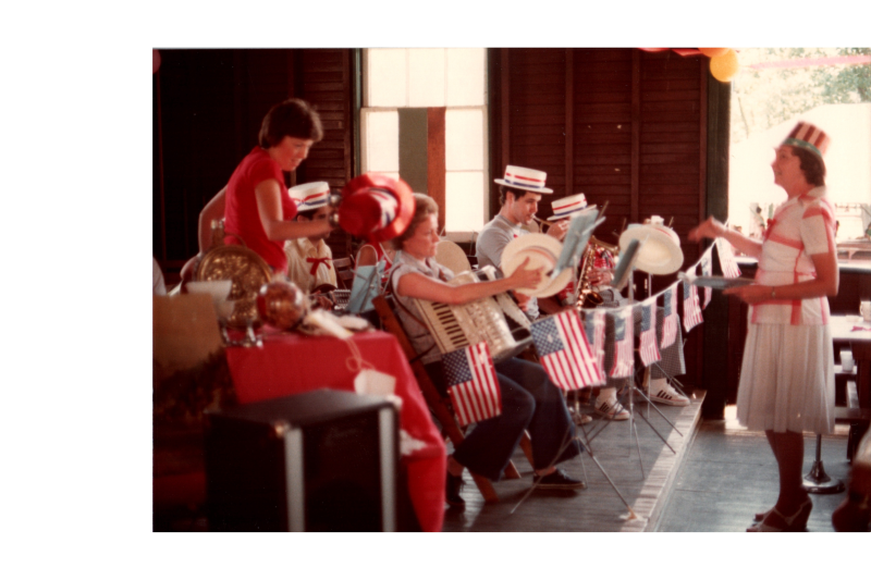 Musicians dressed in American flag-themed outfits
