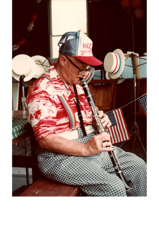 A man plays the oboe in a "Rizzo 3rd Term Cap"