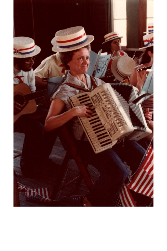 A woman plays accordion