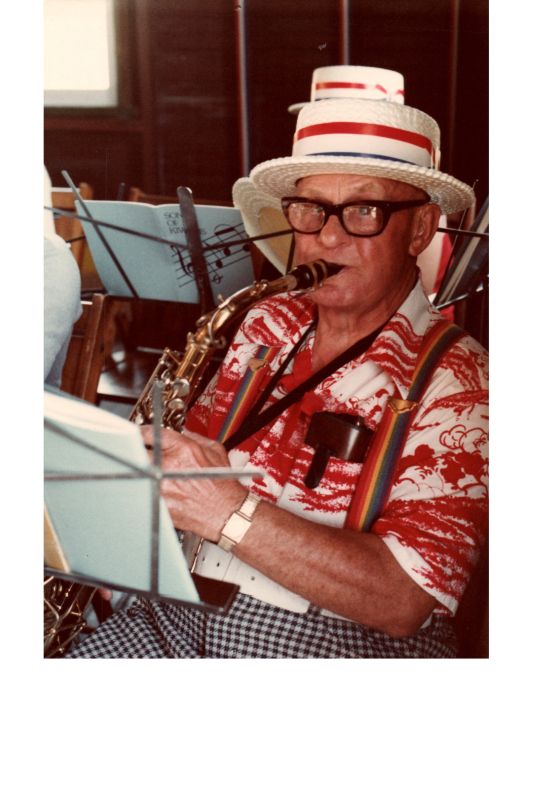 A man plays a saxophone