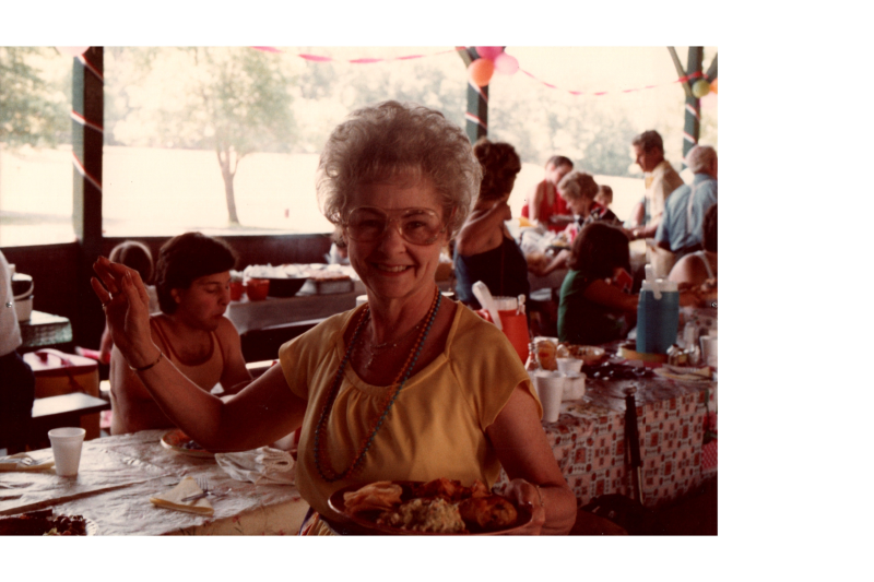 A woman with a plate of food