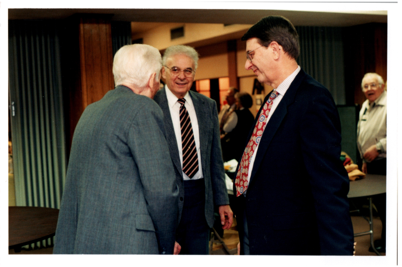 Pastors Bogdan and Wegner speak with a man