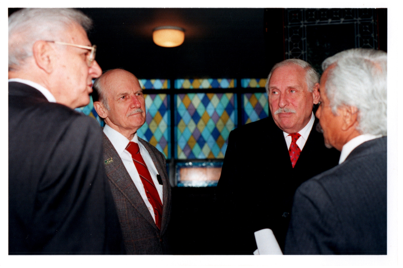 Pastor Bogdan speaks with members of the congregation