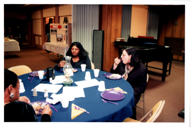 Congregants, including Candace Wegner and Mrs. Bustos, eat together