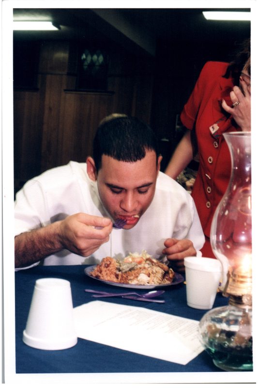 A man eats a salad