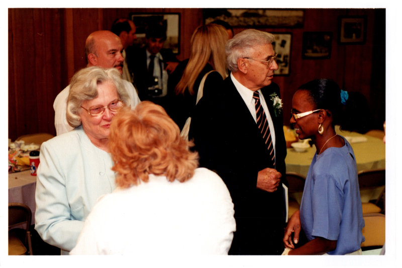 The Bogdans greet congregants