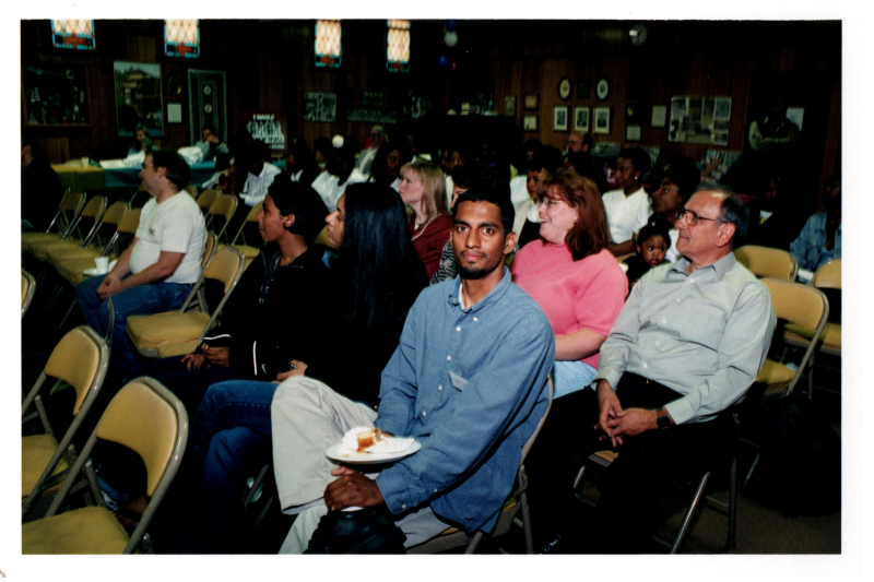 Congregants look to a stage