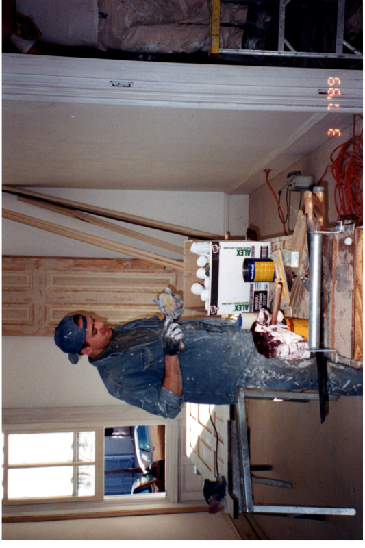 A man works inside the parsonnage