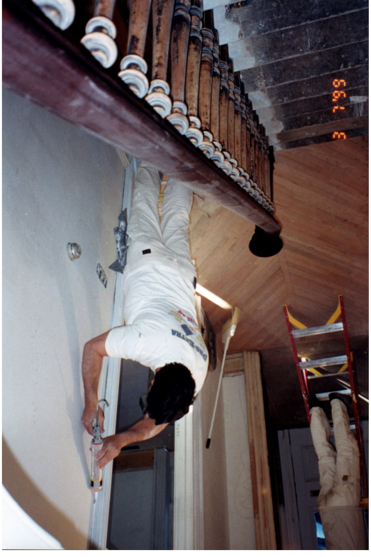 A man caulks