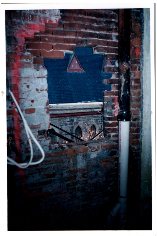 Brick opening for a window facing the church
