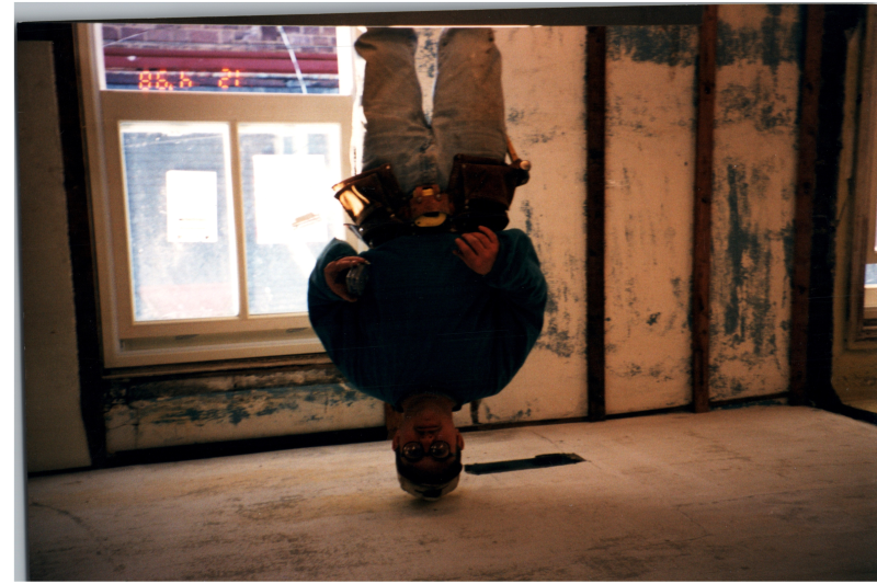 A man works inside the parsonnage
